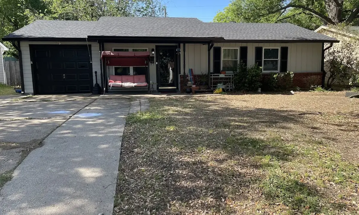 Asphalt Shingle Roof Repair crew at work on a residential roof in Travelers Rest